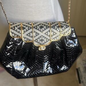 Vintage black crossbody clutch for the evening.